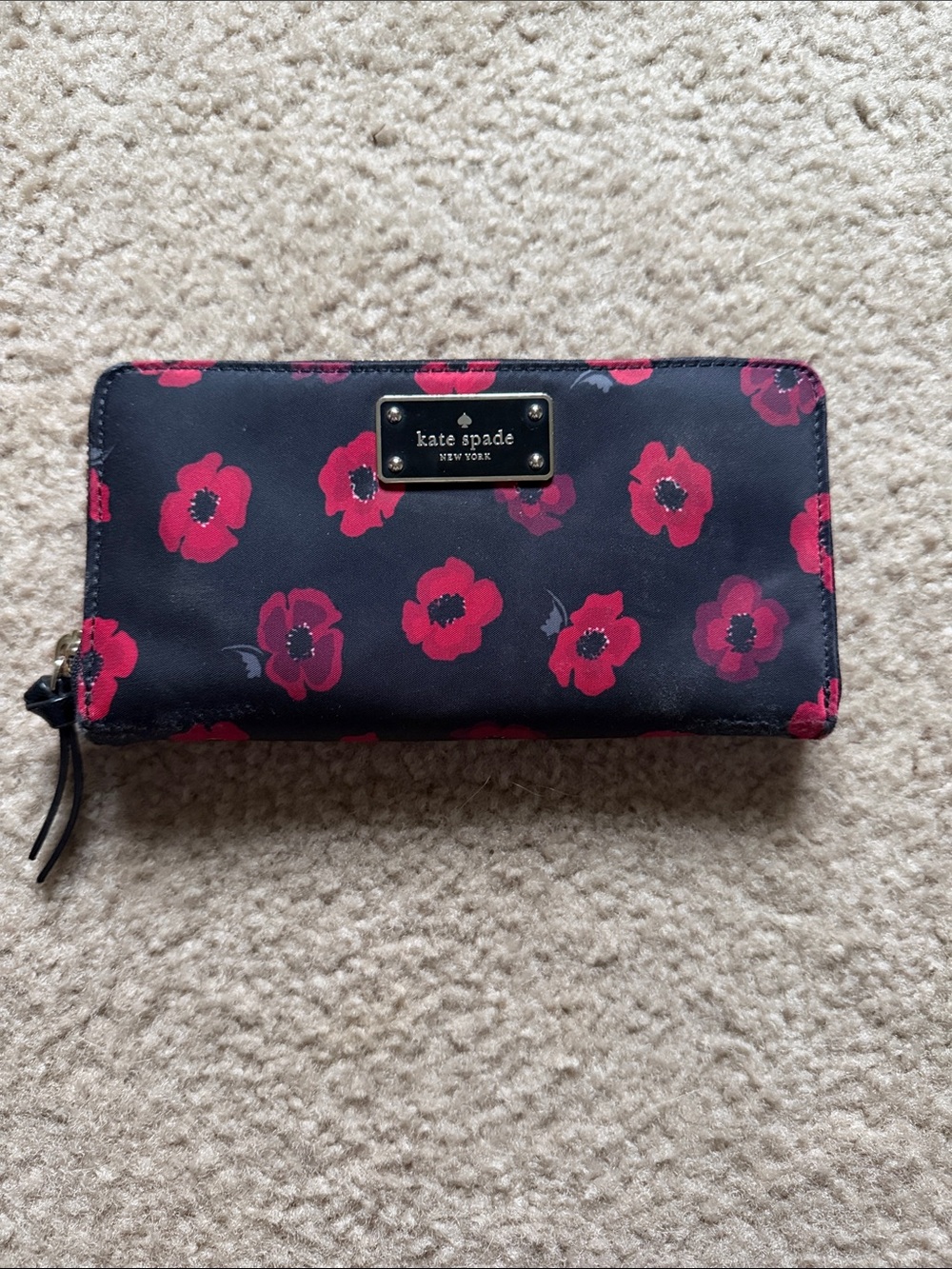 kate spade black wallet with red floral print zip-around